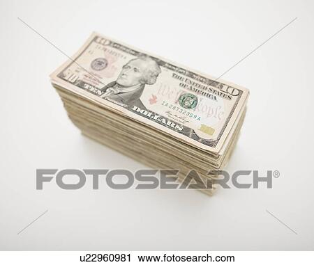 USA, Illinois, Metamora, Studio shot of stack of American banknotes View Large Photo Image Stock Image - USA, Illinois, Metamora, Studio shot of stack of American banknotes. Fotosearch