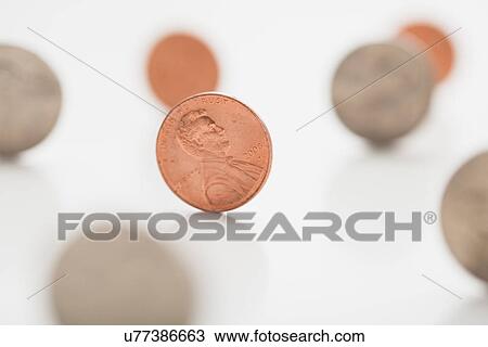 Stock Image - USA, Illinois, Metamora, Studio shot of coins. Fotosearch