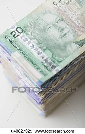 USA, Illinois, Metamora, Studio shot of stack of Canadian banknotes View Large Photo Image Stock Photography - USA, Illinois, Metamora, Studio shot of stack of Canadian banknotes. Fotosearch