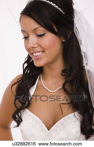 USA, Illinois, Metamora, Studio portrait of bride View Large Photo Image Stock Photograph - USA, Illinois, Metamora, Studio portrait of bride. Fotosearch