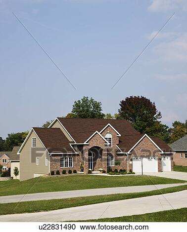 USA, Illinois, Metamora, Suburban house View Large Photo Image Stock Image - USA, Illinois, Metamora, Suburban house. Fotosearch