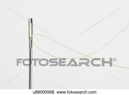 Stock Photo - USA, Illinois, Metamora, thread and needle. Fotosearch