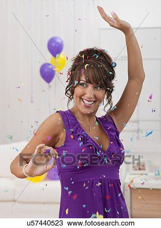 USA, Illinois, Metamora, Woman dancing at New Year's Eve party View Large Photo Image Stock Image - USA, Illinois, Metamora, Woman dancing at New Year's Eve party. Fotosearch