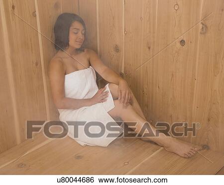 USA, Illinois, Metamora, Young woman relaxing in sauna View Large Photo Image Stock Photograph - USA, Illinois, Metamora, Young woman relaxing in sauna. Fotosearch