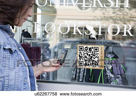USA, Illinois, Peoria, Woman using smart phone device View Large Photo Image Stock Photo - USA, Illinois, Peoria, Woman using smart phone device. Fotosearch