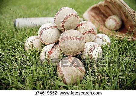 USA, Minnesota, Roseville, baseballs, baseball bat and glove in grass View Large Photo Image Stock Image - USA, Minnesota, Roseville, baseballs, baseball bat and glove in grass. Fotosearch