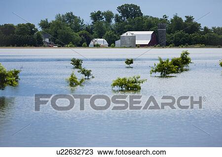 USA, Missouri, Barn and silo in flood View Large Photo Image Stock Image - USA, Missouri, Barn and silo in flood. Fotosearch