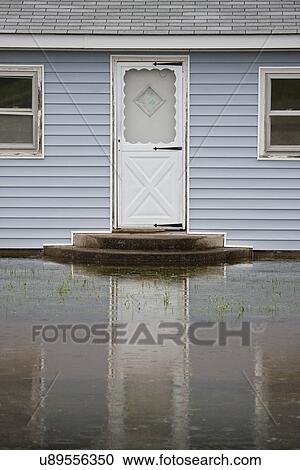 USA, Missouri, Cottage house in flood View Large Photo Image Stock Image - USA, Missouri, Cottage house in flood. Fotosearch