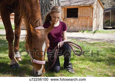 USA, New Jersey, Hardwick, Girl with horse at farm View Large Photo Image Stock Image - USA, New Jersey, Hardwick, Girl with horse at farm. Fotosearch