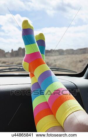 USA, New Mexico, Girl (10-11) with feet on car dashboard, wearing striped socks View Large Photo Image Stock Image - USA, New Mexico, Girl (10-11) with feet on car dashboard, wearing striped socks. Fotosearch