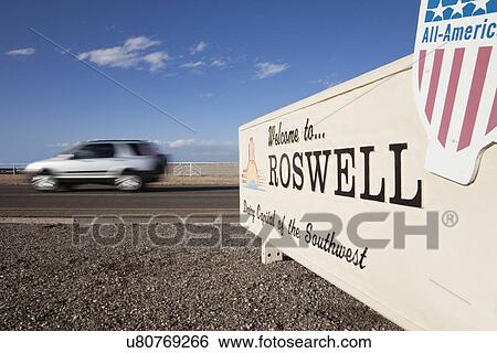USA, New Mexico, Roswell, Car speeding past welcome sign View Large Photo Image Stock Photograph - USA, New Mexico, Roswell, Car speeding past welcome sign. Fotosearch