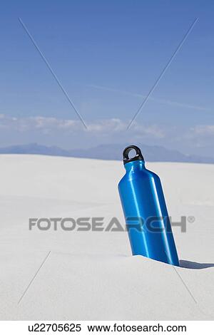 USA, New Mexico, Whitesands, Blue thermos buried in sand View Large Photo Image Stock Photography - USA, New Mexico, Whitesands, Blue thermos buried in sand. Fotosearch
