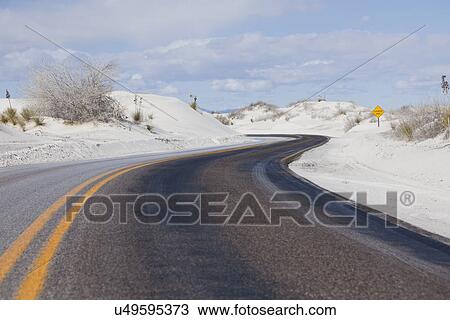 USA, New Mexico, Whitesands, Desert road View Large Photo Image Stock Image - USA, New Mexico, Whitesands, Desert road. Fotosearch