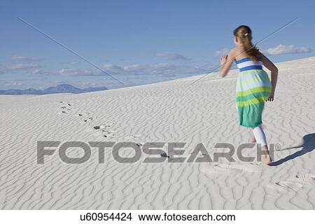 USA, New Mexico, Whitesands, Girl (10-11) running on desert View Large Photo Image Picture - USA, New Mexico, Whitesands, Girl (10-11) running on desert. Fotosearch