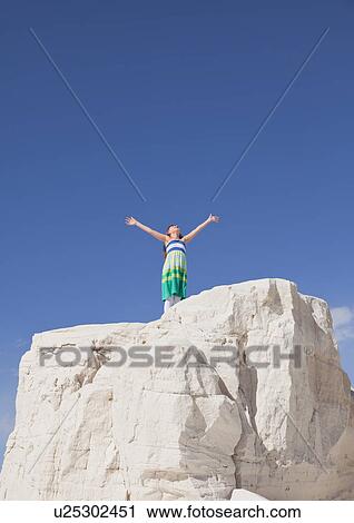 USA, New Mexico, Whitesands, Girl (10-11) standing on rock View Large Photo Image Stock Image - USA, New Mexico, Whitesands, Girl (10-11) standing on rock. Fotosearch