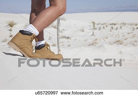 USA, New Mexico, Whitesands, Low section of man on desert View Large Photo Image Stock Photo - USA, New Mexico, Whitesands, Low section of man on desert. Fotosearch