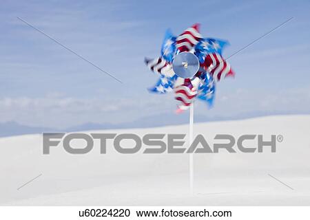 Stock Image - USA, New Mexico, Whitesands, Pinwheel on desert. Fotosearch