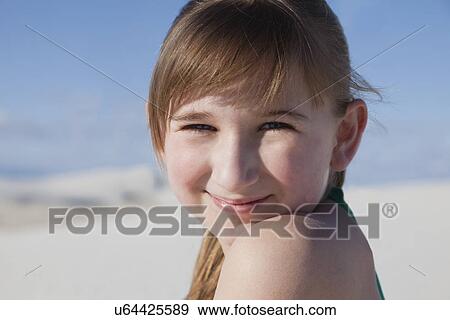 USA, New Mexico, Whitesands, Portrait of smiling girl (10-11) View Large Photo Image Stock Photo - USA, New Mexico, Whitesands, Portrait of smiling girl (10-11). Fotosearch