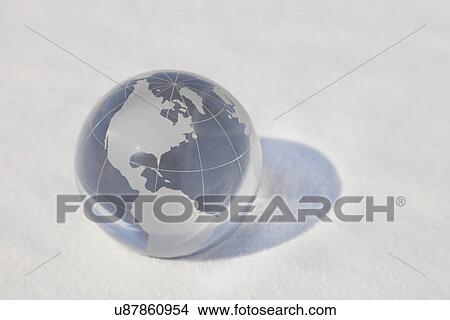 Picture - USA, New Mexico, Whitesands, Small glass globe on desert. Fotosearch