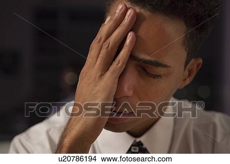 Picture - USA, New York City, businessman falling asleep. Fotosearch