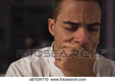 USA, New York City, businessman with hand on chin and closed eyes View Large Photo Image Stock Image - USA, New York City, businessman with hand on chin and closed eyes. Fotosearch
