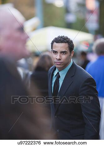 USA, New York, New York City, Businessman in crowd View Large Photo Image Stock Photograph - USA, New York, New York City, Businessman in crowd. Fotosearch