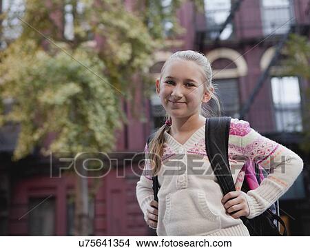 Picture - USA, New York State, New York City, Portrait of girl (10-11) with backpack . Fotosearch