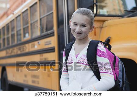 USA, New York State, New York City, Portrait of smiling girl (10-11), school bus in background View Large Photo Image Stock Image - USA, New York State, New York City, Portrait of smiling girl (10-11), school bus in background. Fotosearch