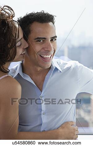 USA, New York State, New York City, young couple embracing by window View Large Photo Image Stock Image - USA, New York State, New York City, young couple embracing by window. Fotosearch