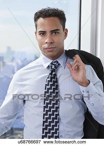 USA, New York State, New York City, portrait of young business man View Large Photo Image Stock Photo - USA, New York State, New York City, portrait of young business man. Fotosearch