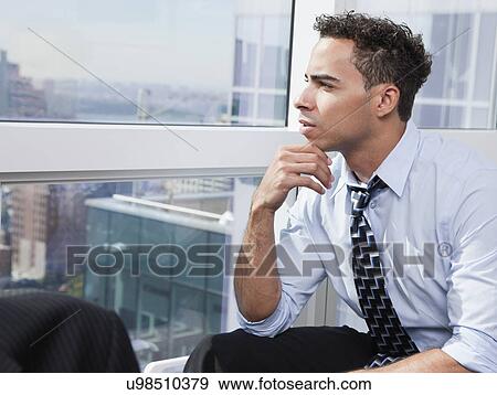 USA, New York State, New York City, business man looking through window View Large Photo Image Stock Photo - USA, New York State, New York City, business man looking through window. Fotosearch