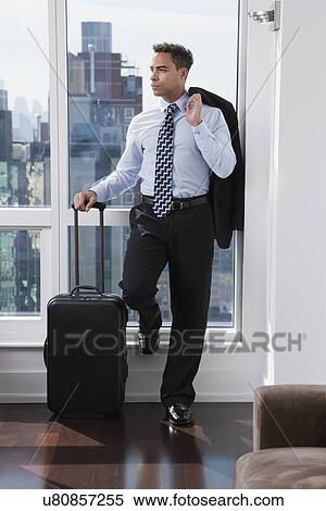 USA, New York State, New York City, business man standing by window View Large Photo Image Stock Photography - USA, New York State, New York City, business man standing by window. Fotosearch