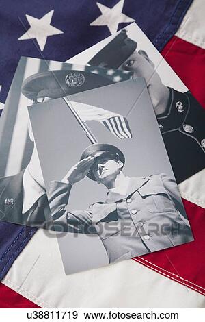 Stock Photo - Veterans photos against American flag. Fotosearch