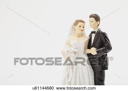 Wedding figurines, studio shot View Large Photo Image Stock Image - Wedding figurines, studio shot. Fotosearch