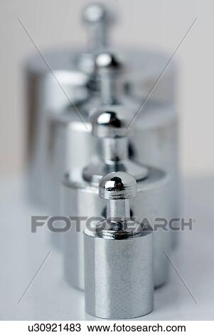 Weights in a row View Large Photo Image Stock Image - Weights in a row. Fotosearch