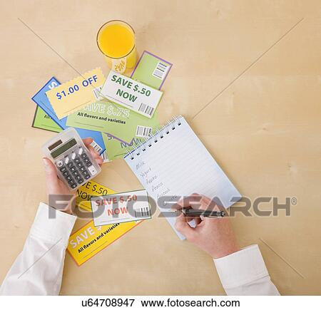 Woman doing shopping list View Large Photo Image Stock Photo - Woman doing shopping list. Fotosearch