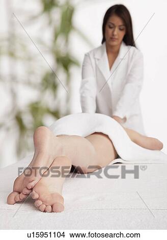 Woman receiving massage View Large Photo Image Picture - Woman receiving massage. Fotosearch