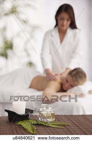 Woman receiving massage View Large Photo Image Stock Image - Woman receiving massage. Fotosearch