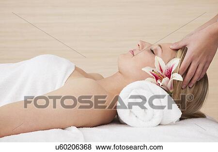 Woman receiving massage View Large Photo Image Stock Photo - Woman receiving massage. Fotosearch