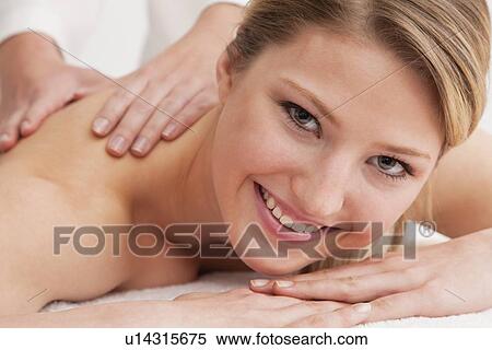 Woman receiving massage View Large Photo Image Stock Photography - Woman receiving massage. Fotosearch