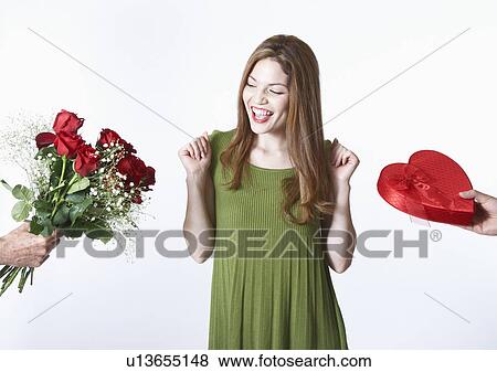 Woman receiving Valentine's gifts View Large Photo Image Stock Photo - Woman receiving Valentine's gifts. Fotosearch