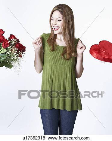 Woman receiving Valentine's gifts View Large Photo Image Stock Photo - Woman receiving Valentine's gifts. Fotosearch
