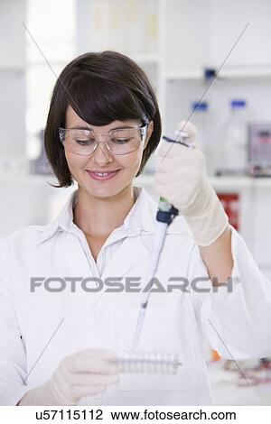 Young female scientist View Large Photo Image Stock Image - Young female scientist. Fotosearch
