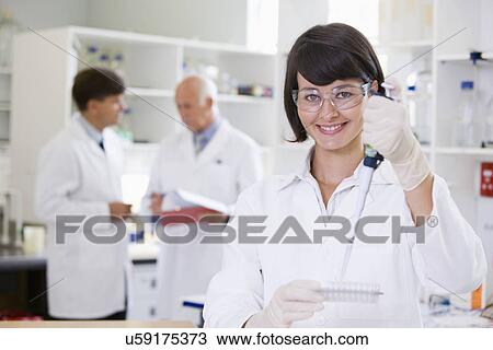 Young female scientist View Large Photo Image Stock Image - Young female scientist. Fotosearch