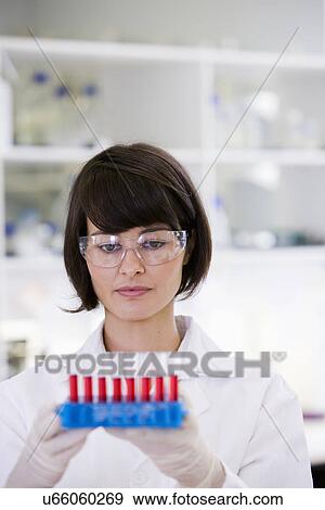 Stock Photo - Young female scientist. Fotosearch