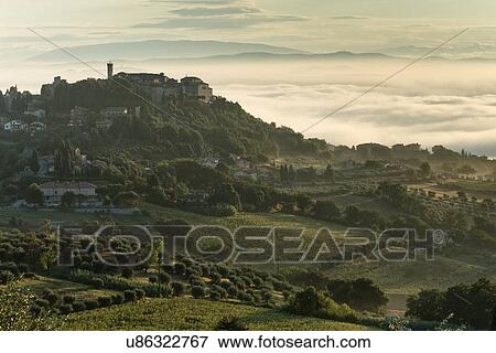 Dawn over MonteCastello di Vibio, Umbria, Italy View Large Photo Image Stock Photo - Dawn over MonteCastello di Vibio, Umbria, Italy. Fotosearch