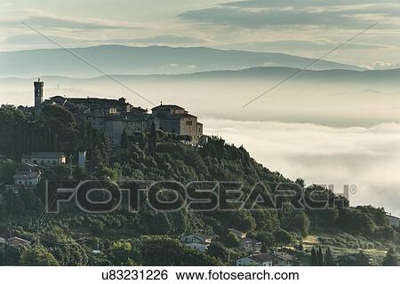 Dawn over MonteCastello di Vibio, Umbria, Italy View Large Photo Image Stock Photograph - Dawn over MonteCastello di Vibio, Umbria, Italy. Fotosearch
