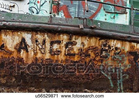 Stock Image - Ships and shipwrecks in Ushuaia harbour, Argentina. Fotosearch