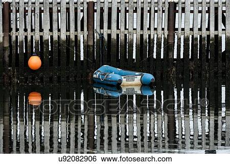 Stock Photograph - Ships and shipwrecks in Ushuaia harbour, Argentina. Fotosearch