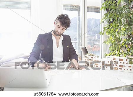 Architect working in office View Large Photo Image Picture - Architect working in office. Fotosearch